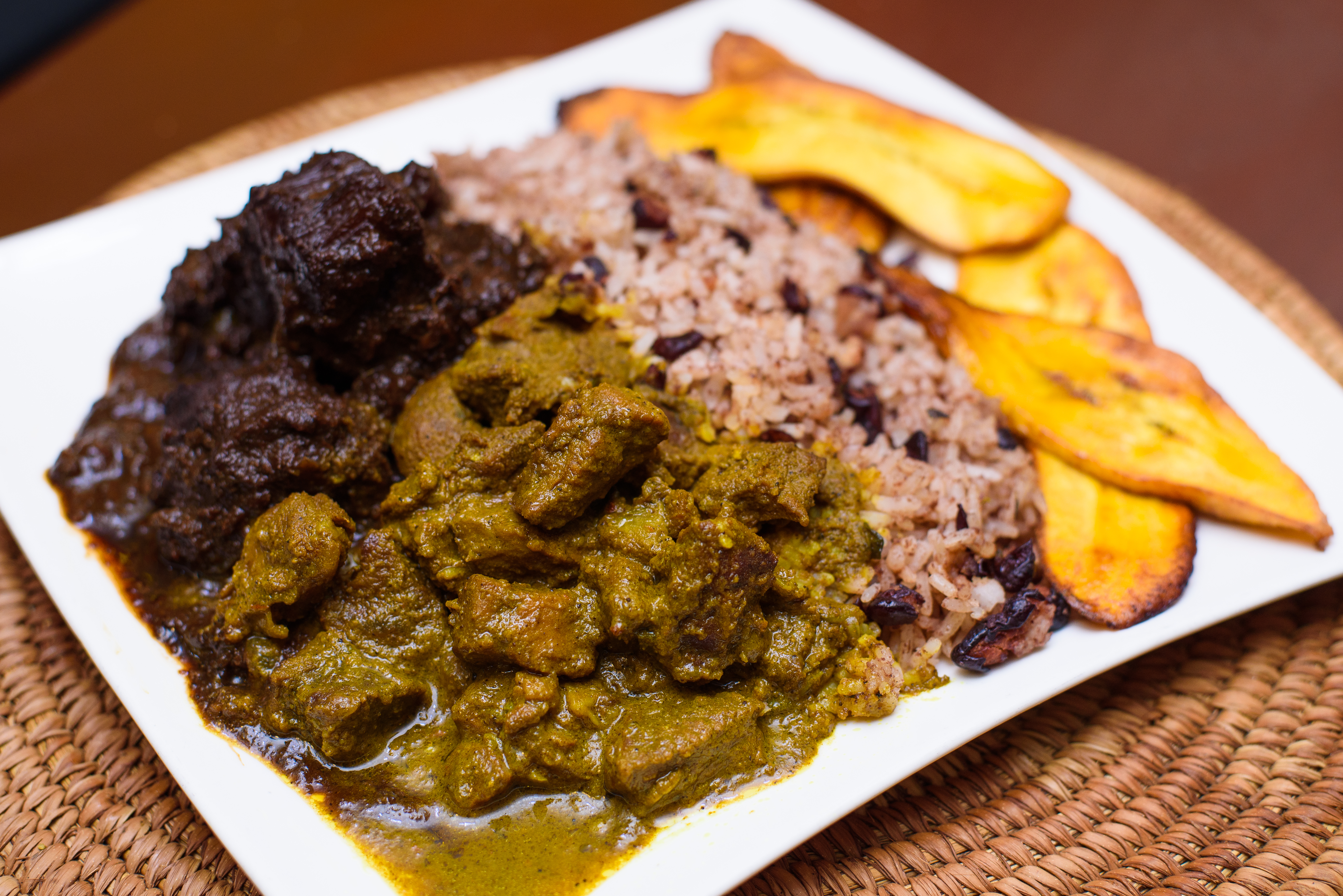 3. Brown stew oxtail & Curry Goat - Large